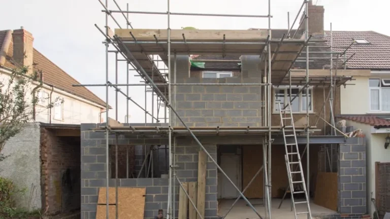 Two-storey home extension under construction with scaffolding, representing council approval for NSW home extensions
